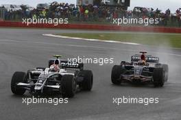 06.07.2008 Silverstone, England,  Kazuki Nakajima (JPN), Williams F1 Team, FW30 and Sebastian Bourdais (FRA), Scuderia Toro Rosso, STR03 - Formula 1 World Championship, Rd 9, British Grand Prix, Sunday Race