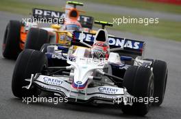 06.07.2008 Silverstone, England,  Robert Kubica (POL),  BMW Sauber F1 Team leads Nelson Piquet Jr (BRA), Renault F1 Team - Formula 1 World Championship, Rd 9, British Grand Prix, Sunday Race