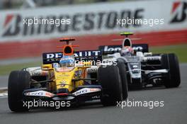 06.07.2008 Silverstone, England,  Fernando Alonso (ESP), Renault F1 Team, R28 and Kazuki Nakajima (JPN), Williams F1 Team, FW30 - Formula 1 World Championship, Rd 9, British Grand Prix, Sunday Race