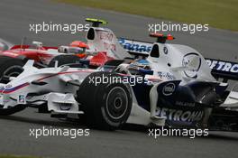 06.07.2008 Silverstone, England,  Timo Glock (GER), Toyota F1 Team, TF108 and Nick Heidfeld (GER), BMW Sauber F1 Team, F1.08 - Formula 1 World Championship, Rd 9, British Grand Prix, Sunday Race