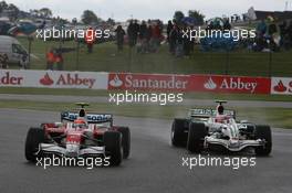 06.07.2008 Silverstone, England,  Timo Glock (GER), Toyota F1 Team, TF108 and Rubens Barrichello (BRA), Honda Racing F1 Team, RA108 - Formula 1 World Championship, Rd 9, British Grand Prix, Sunday Race
