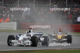 06.07.2008 Silverstone, England,  Nick Heidfeld (GER), BMW Sauber F1 Team, F1.08 and Fernando Alonso (ESP), Renault F1 Team, R28 - Formula 1 World Championship, Rd 9, British Grand Prix, Sunday Race