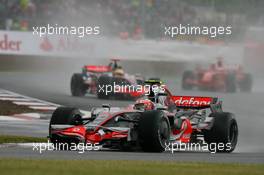 06.07.2008 Silverstone, England,  Heikki Kovalainen (FIN), McLaren Mercedes, MP4-23 leads Lewis Hamilton (GBR), McLaren Mercedes - Formula 1 World Championship, Rd 9, British Grand Prix, Sunday Race