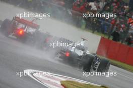 06.07.2008 Silverstone, England,  Heikki Kovalainen (FIN), McLaren Mercedes, MP4-23 and Nick Heidfeld (GER), BMW Sauber F1 Team, F1.08 - Formula 1 World Championship, Rd 9, British Grand Prix, Sunday Race