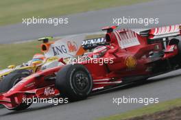 06.07.2008 Silverstone, England,  Nelson Piquet Jr (BRA), Renault F1 Team, R28 and Kimi Raikkonen (FIN), Räikkönen, Scuderia Ferrari, F2008 - Formula 1 World Championship, Rd 9, British Grand Prix, Sunday Race