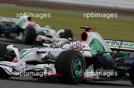 06.07.2008 Silverstone, England,  Jenson Button (GBR), Honda Racing F1 Team, RA108 leads Rubens Barrichello (BRA), Honda Racing F1 Team, RA108 - Formula 1 World Championship, Rd 9, British Grand Prix, Sunday Race