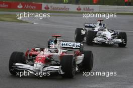 06.07.2008 Silverstone, England,  Jarno Trulli (ITA), Toyota Racing, TF108 and Nick Heidfeld (GER), BMW Sauber F1 Team, F1.08 - Formula 1 World Championship, Rd 9, British Grand Prix, Sunday Race
