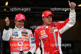 05.07.2008 Silverstone, England,  pole sitter Heikki Kovalainen (FIN), McLaren Mercedes with Kimi Raikkonen (FIN), Räikkönen, Scuderia Ferrari - Formula 1 World Championship, Rd 9, British Grand Prix, Saturday Qualifying