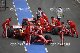 05.07.2008 Silverstone, England,  Felipe Massa (BRA), Scuderia Ferrari, F2008 and Kimi Raikkonen (FIN), Räikkönen, Scuderia Ferrari, F2008 - Formula 1 World Championship, Rd 9, British Grand Prix, Saturday Qualifying