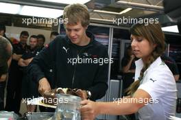 03.07.2008 Silverstone, England,  Sebastian Vettel (GER), Scuderia Toro Rosso, celebrates his 21st birthday - Formula 1 World Championship, Rd 9, British Grand Prix, Thursday