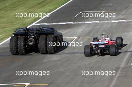 03.07.2008 Silverstone, England,  The batmobile and Timo Glock (GER), Toyota F1 Team - Formula 1 World Championship, Rd 9, British Grand Prix, Thursday