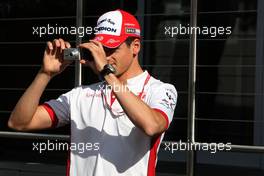 03.07.2008 Silverstone, England,  Adrian Sutil (GER), Force India F1 Team takes a picture - Formula 1 World Championship, Rd 9, British Grand Prix, Thursday