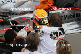 20.07.2008 Hockenheim, Germany,  Lewis Hamilton (GBR), McLaren Mercedes and Norbert Haug (GER), Mercedes, Motorsport chief - Formula 1 World Championship, Rd 10, German Grand Prix, Sunday Podium