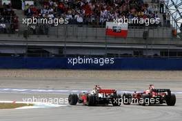 20.07.2008 Hockenheim, Germany,  Lewis Hamilton (GBR), McLaren Mercedes overtakes Felipe Massa (BRA), Scuderia Ferrari - Formula 1 World Championship, Rd 10, German Grand Prix, Sunday Race