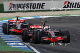 20.07.2008 Hockenheim, Germany,  Heikki Kovalainen (FIN), McLaren Mercedes, MP4-23 leads Lewis Hamilton (GBR), McLaren Mercedes, MP4-23 - Formula 1 World Championship, Rd 10, German Grand Prix, Sunday Race