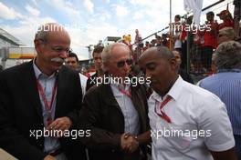 20.07.2008 Hockenheim, Germany,  Dr. Dieter Zetsche (GER), Chairman of Daimler with Prof. Jurgen Hubbert (GER), Board of Management DaimlerChrysler and Anthony Hamilton (GBr), Father of Lewis Hamilton - Formula 1 World Championship, Rd 10, German Grand Prix, Sunday Race