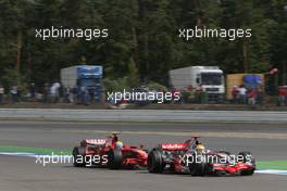 20.07.2008 Hockenheim, Germany,  Lewis Hamilton (GBR), McLaren Mercedes overtakes Felipe Massa (BRA), Scuderia Ferrari - Formula 1 World Championship, Rd 10, German Grand Prix, Sunday Race