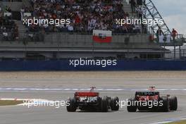 20.07.2008 Hockenheim, Germany,  Lewis Hamilton (GBR), McLaren Mercedes overtakes Felipe Massa (BRA), Scuderia Ferrari - Formula 1 World Championship, Rd 10, German Grand Prix, Sunday Race