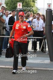 20.07.2008 Hockenheim, Germany,  Michael Schumacher (GER),  Scuderia Ferrari arrives at the trackside - Formula 1 World Championship, Rd 10, German Grand Prix, Sunday