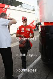 20.07.2008 Hockenheim, Germany,  Michael Schumacher (GER),  Scuderia Ferrari arrives at the trackside - Formula 1 World Championship, Rd 10, German Grand Prix, Sunday