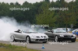 17.07.2008 Hockenheim, Germany,  Heikki Kovalainen (FIN), McLaren Mercedes and Lewis Hamilton (GBR), McLaren Mercedes driving McLaren Mercedes SLR's - Formula 1 World Championship, Rd 10, German Grand Prix, Thursday