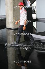 17.07.2008 Hockenheim, Germany,  Lewis Hamilton (GBR), McLaren Mercedes wearing wellies - Formula 1 World Championship, Rd 10, German Grand Prix, Thursday