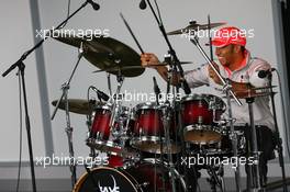 17.07.2008 Hockenheim, Germany,  Lewis Hamilton (GBR), McLaren Mercedes playing the drums - Formula 1 World Championship, Rd 10, German Grand Prix, Thursday