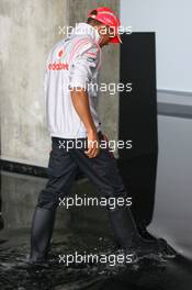 17.07.2008 Hockenheim, Germany,  Lewis Hamilton (GBR), McLaren Mercedes wearing wellies - Formula 1 World Championship, Rd 10, German Grand Prix, Thursday