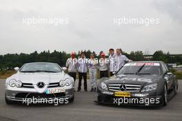 17.07.2008 Hockenheim, Germany,  Lewis Hamilton (GBR), McLaren Mercedes and Heikki Kovalainen (FIN), McLaren Mercedes with DTM Drivers - Formula 1 World Championship, Rd 10, German Grand Prix, Thursday