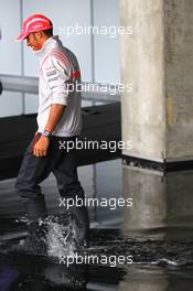 17.07.2008 Hockenheim, Germany,  Lewis Hamilton (GBR), McLaren Mercedes wearing wellies - Formula 1 World Championship, Rd 10, German Grand Prix, Thursday