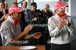 17.07.2008 Hockenheim, Germany,  Lewis Hamilton (GBR), McLaren Mercedes and Heikki Kovalainen (FIN), McLaren Mercedes watch Norbert Haug (GER), Mercedes, Motorsport chief playing the drums - Formula 1 World Championship, Rd 10, German Grand Prix, Thursday