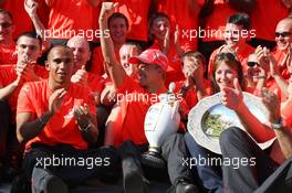 03.08.2008 Budapest, Hungary,  Lewis Hamilton (GBR), McLaren Mercedes, Heikki Kovalainen (FIN), McLaren Mercedes celebrates his first win, and his girlfriend Catherine Hyde (GBR) - Formula 1 World Championship, Rd 11, Hungarian Grand Prix, Sunday Podium