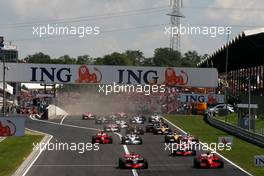 03.08.2008 Budapest, Hungary,  Start, Felipe Massa (BRA), Scuderia Ferrari, F2008 leads Lewis Hamilton (GBR), McLaren Mercedes - Formula 1 World Championship, Rd 11, Hungarian Grand Prix, Sunday Race