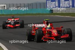 03.08.2008 Budapest, Hungary,  Felipe Massa (BRA), Scuderia Ferrari, F2008 and Lewis Hamilton (GBR), McLaren Mercedes, MP4-23 - Formula 1 World Championship, Rd 11, Hungarian Grand Prix, Sunday Race