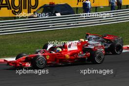 03.08.2008 Budapest, Hungary,  Start, Lewis Hamilton (GBR), McLaren Mercedes, MP4-23 and Felipe Massa (BRA), Scuderia Ferrari, F2008 - Formula 1 World Championship, Rd 11, Hungarian Grand Prix, Sunday Race