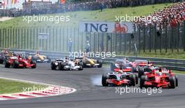 03.08.2008 Budapest, Hungary,  Start, Felipe Massa (BRA), Scuderia Ferrari, F2008 leads Lewis Hamilton (GBR), McLaren Mercedes, MP4-23 - Formula 1 World Championship, Rd 11, Hungarian Grand Prix, Sunday Race