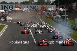 03.08.2008 Budapest, Hungary,  Start, Lewis Hamilton (GBR), McLaren Mercedes, MP4-23 and Felipe Massa (BRA), Scuderia Ferrari, F2008 - Formula 1 World Championship, Rd 11, Hungarian Grand Prix, Sunday Race