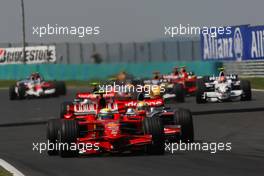 03.08.2008 Budapest, Hungary,  Start, Felipe Massa (BRA), Scuderia Ferrari, F2008 leads Lewis Hamilton (GBR), McLaren Mercedes - Formula 1 World Championship, Rd 11, Hungarian Grand Prix, Sunday Race