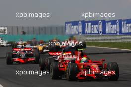 03.08.2008 Budapest, Hungary,  Start, Felipe Massa (BRA), Scuderia Ferrari, F2008 leads Lewis Hamilton (GBR), McLaren Mercedes - Formula 1 World Championship, Rd 11, Hungarian Grand Prix, Sunday Race