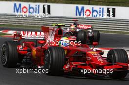 03.08.2008 Budapest, Hungary,  Felipe Massa (BRA), Scuderia Ferrari, F2008 leads Lewis Hamilton (GBR), McLaren Mercedes, MP4-23 - Formula 1 World Championship, Rd 11, Hungarian Grand Prix, Sunday Race