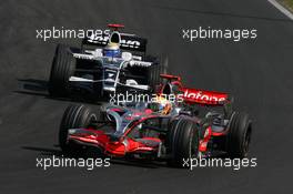 03.08.2008 Budapest, Hungary,  Lewis Hamilton (GBR), McLaren Mercedes, MP4-23 leads Nico Rosberg (GER), WilliamsF1 Team, FW30 - Formula 1 World Championship, Rd 11, Hungarian Grand Prix, Sunday Race