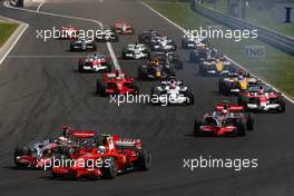 03.08.2008 Budapest, Hungary,  Start, Lewis Hamilton (GBR), McLaren Mercedes, MP4-23 and Felipe Massa (BRA), Scuderia Ferrari, F2008 - Formula 1 World Championship, Rd 11, Hungarian Grand Prix, Sunday Race