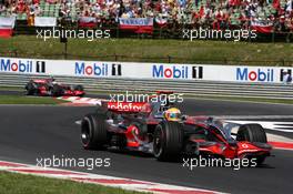 03.08.2008 Budapest, Hungary,  Lewis Hamilton (GBR), McLaren Mercedes, MP4-23 leads Heikki Kovalainen (FIN), McLaren Mercedes, MP4-23 - Formula 1 World Championship, Rd 11, Hungarian Grand Prix, Sunday Race