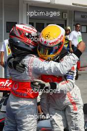 02.08.2008 Budapest, Hungary,  Heikki Kovalainen (FIN), McLaren Mercedes with pole position sitter Lewis Hamilton (GBR), McLaren Mercedes  - Formula 1 World Championship, Rd 11, Hungarian Grand Prix, Saturday Qualifying