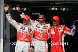 02.08.2008 Budapest, Hungary,  Heikki Kovalainen (FIN), McLaren Mercedes with pole position sitter Lewis Hamilton (GBR), McLaren Mercedes and Felipe Massa (BRA), Scuderia Ferrari - Formula 1 World Championship, Rd 11, Hungarian Grand Prix, Saturday Qualifying