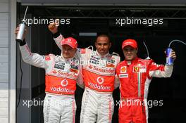 02.08.2008 Budapest, Hungary,  Heikki Kovalainen (FIN), McLaren Mercedes with pole position sitter Lewis Hamilton (GBR), McLaren Mercedes and Felipe Massa (BRA), Scuderia Ferrari - Formula 1 World Championship, Rd 11, Hungarian Grand Prix, Saturday Qualifying