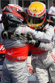 02.08.2008 Budapest, Hungary,  Heikki Kovalainen (FIN), McLaren Mercedes with pole position sitter Lewis Hamilton (GBR), McLaren Mercedes  - Formula 1 World Championship, Rd 11, Hungarian Grand Prix, Saturday Qualifying