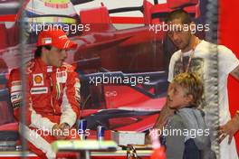12.09.2008 MOnza, Italy,  Felipe Massa (BRA), Scuderia Ferrari with Marco Materazzi (ITA), Italian Football player for Inter Milan, and his son - Formula 1 World Championship, Rd 14, Italian Grand Prix, Friday Practice