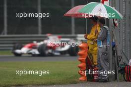 12.09.2008 Monza, Italy,  Jarno Trulli (ITA), Toyota Racing, TF108, marshalls - Formula 1 World Championship, Rd 14, Italian Grand Prix, Friday Practice