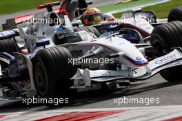 12.09.2008 Monza, Italy,  Nick Heidfeld (GER), BMW Sauber F1 Team, F1.08 and Lewis Hamilton (GBR), McLaren Mercedes, MP4-23 - Formula 1 World Championship, Rd 14, Italian Grand Prix, Friday Practice